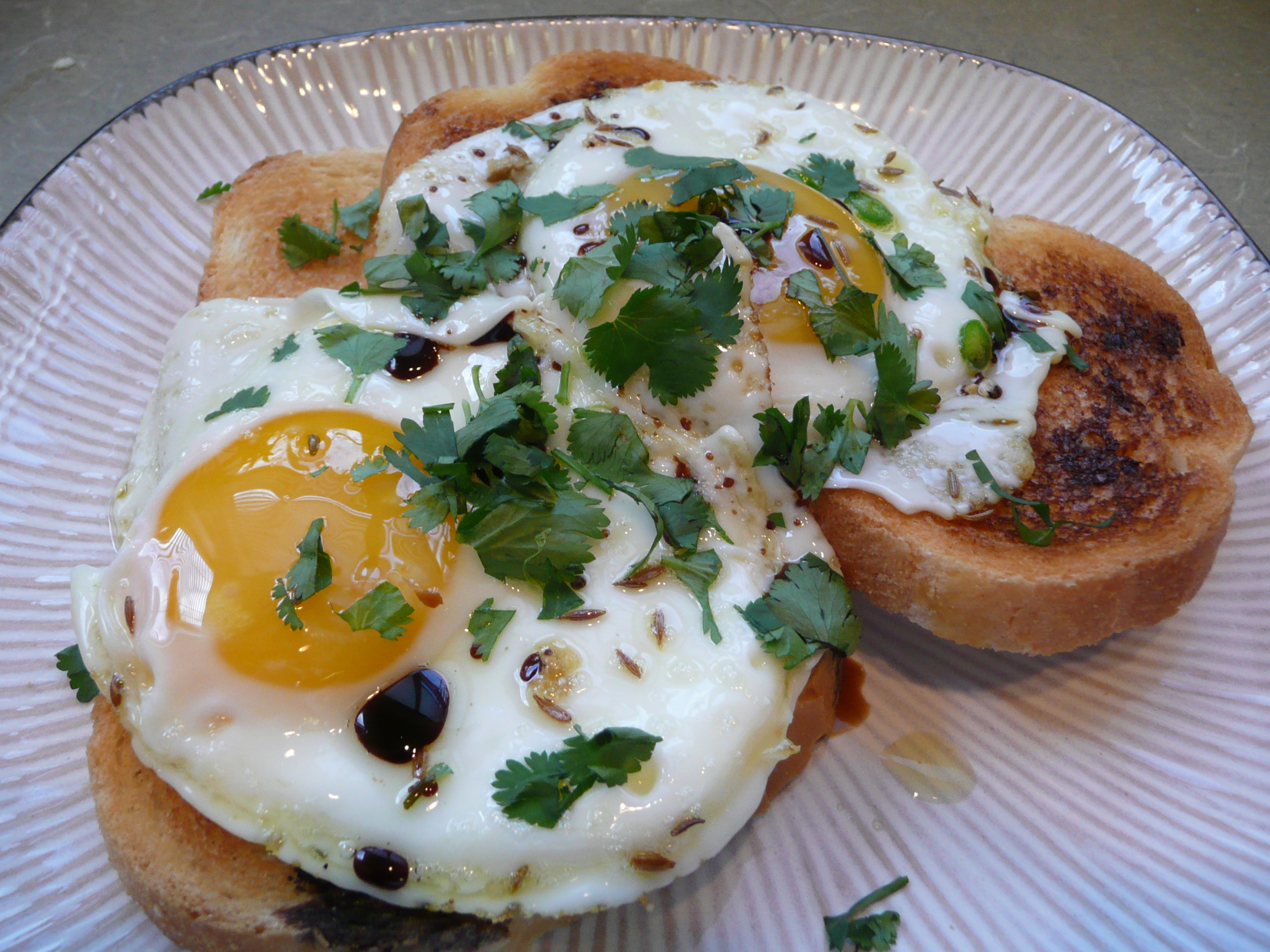 Fried Eggs With Coriander, Cumin And Balsamic Vinegar