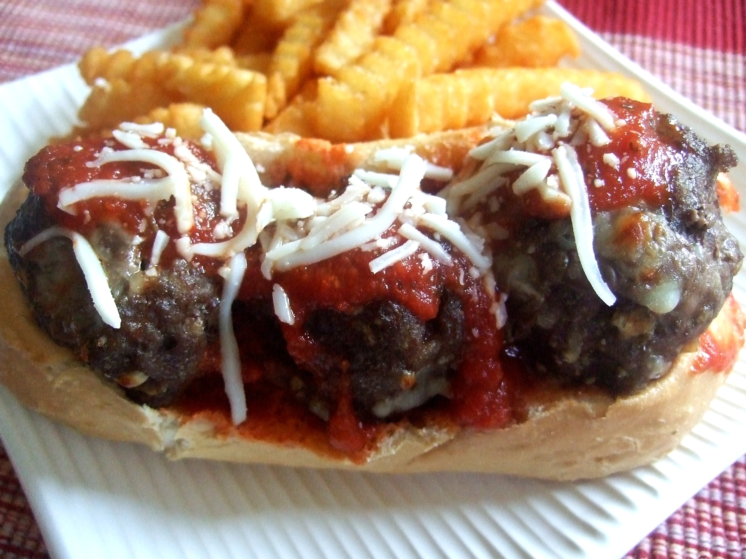 Cheesy Volcano Meatball Sandwiches