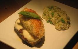 Parmesan Crusted Chicken on Eggplant Sun Dried Tomato and Mozzar. Photo by The Flying Chef Parmesan Crusted Chicken on Eggplant Sun Dried Tomato and Mozzar. Photo by The Flying Chef