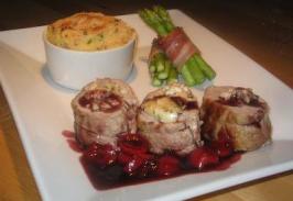 Goats Cheese Stuffed Pork Tenderloin With Red Wine Balsamic Cher. Photo by The Flying Chef Goats Cheese Stuffed Pork Tenderloin With Red Wine Balsamic Cher. Photo by The Flying Chef