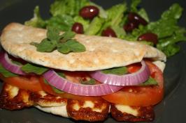 The Traditional Cyprus Sandwich With Halloumi, Onions and Tomato. Photo by Pink_Diamond The Traditional Cyprus Sandwich With Halloumi, Onions and Tomato. Photo by Pink_Diamond