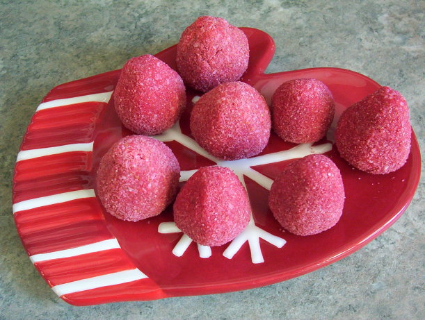 Homemade sugar plums being formed into small balls