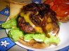 Canadian Burger With Beer-Braised Onions and Cheddar