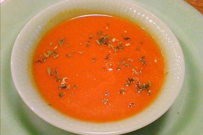 Creamy Tomato Bisque with fresh basil garnish