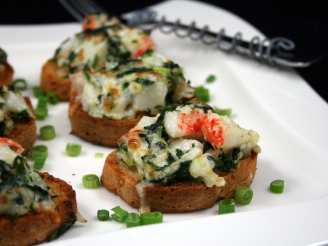 Garlic Bread Topped With Crab Meat and Spinach