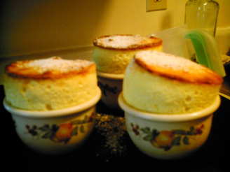 Coconut and White Chocolate Souffles With Mango-Rum Sauce