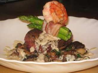 Ostrich Steaks With Prawns and a Roasted Garlic Sauce