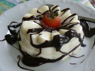 White Chocolate Panna Cotta With Dark Chocolate Sauce