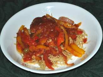 Braised Chicken Thighs With Bell Peppers, Olives and Tomatoes