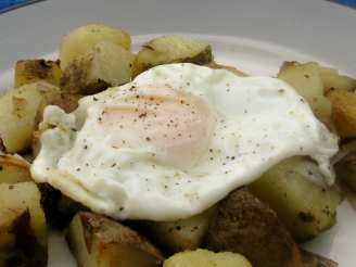 Potato and onion hash with a fried egg (for one)