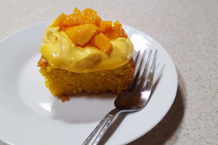 Coconut Cake with Mango Curd Filling - The Seaside Baker