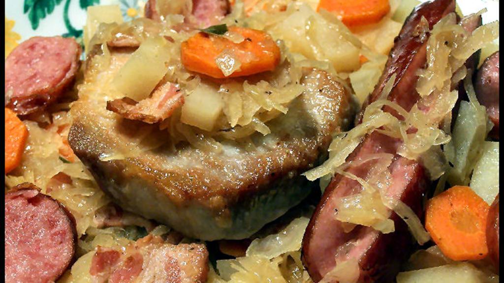 Sauerkraut Smothered With Pork Chops and Sausage Recipe