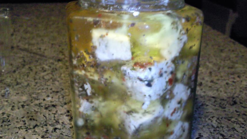 Marinated Feta Cheese With Orange, Green Olives, and Garlic created by Coasty