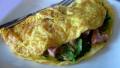 Fluffy Omelette With Ham, Spinach and Swiss Cheese created by Caroline Cooks