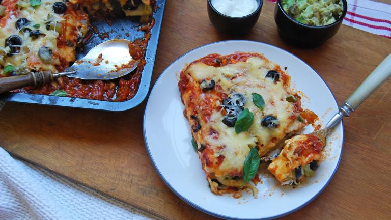 Cheese Enchiladas in Yummy Red Sauce Created by Swirling F.