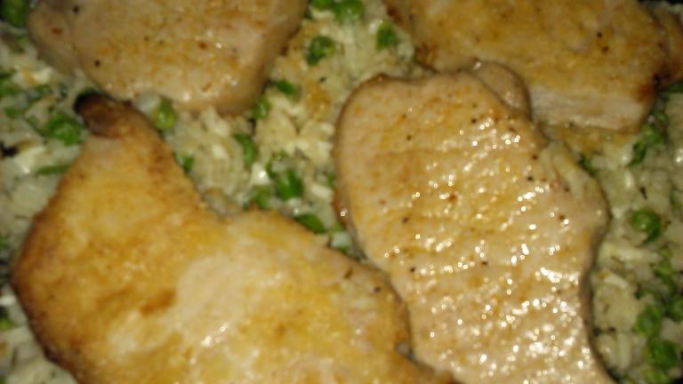 Pork Chops over Parmesan Rice With Peas Created by Ashleyg928