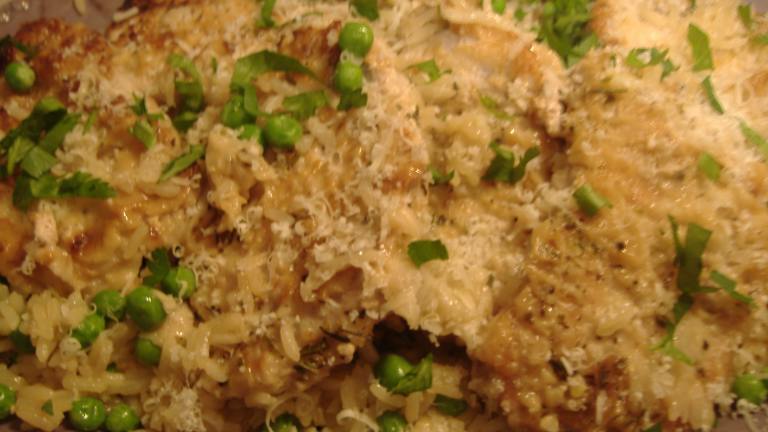 Pork Chops over Parmesan Rice With Peas Created by vrvrvr