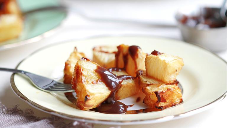 Caramelized Pineapple With Hot Chocolate Sauce Created by Swirling F.