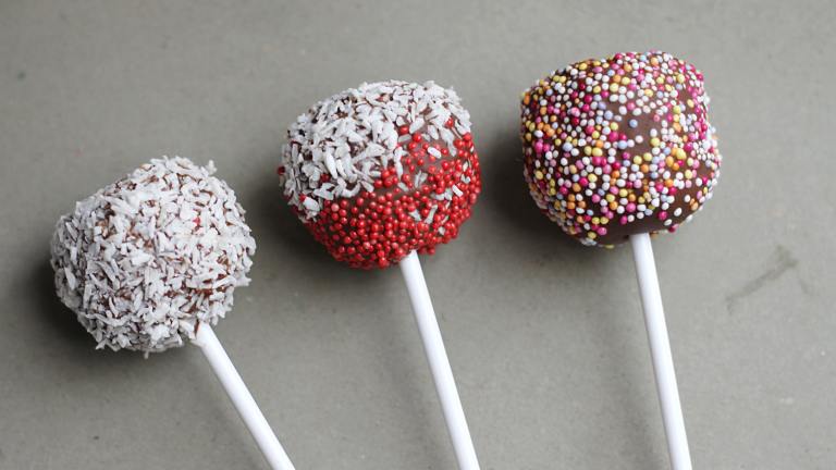 Cherry Cheesecake Cake Pops Created by Swirling F.