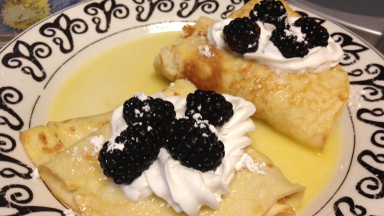 Hot Whiskey Crepes With Raspberries created by piranhabriana