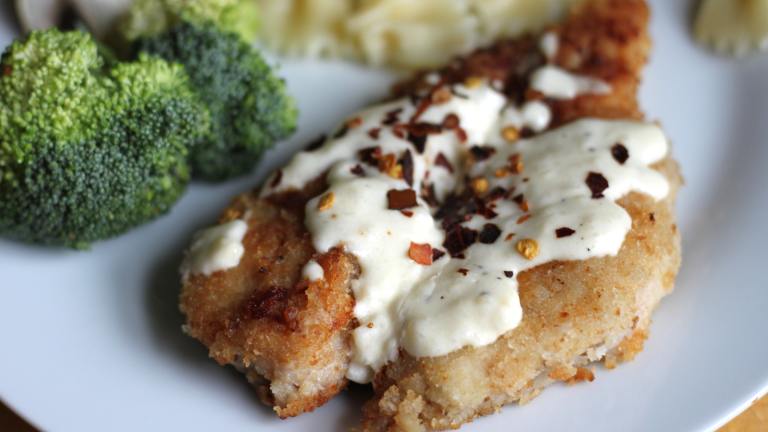 Copycat Olive Garden Parmesan Crusted Chicken Created by Swirling F.