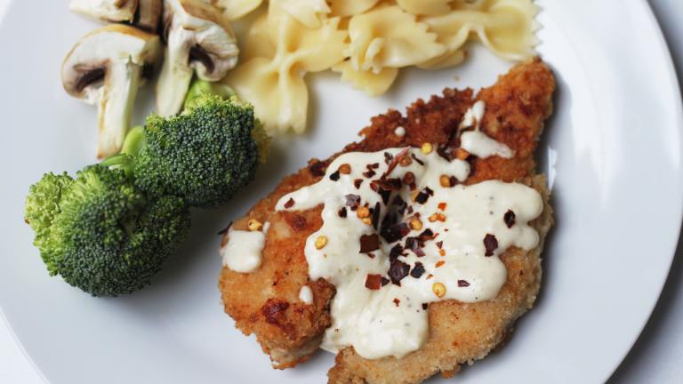 Copycat Olive Garden Parmesan Crusted Chicken Created by Swirling F.