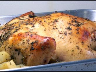 Roast Chicken Stuffed with Herbed Potatoes