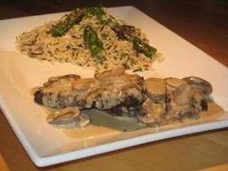 Ostrich Steaks With Mushroom Vanilla Sauce and Wild Rice With As