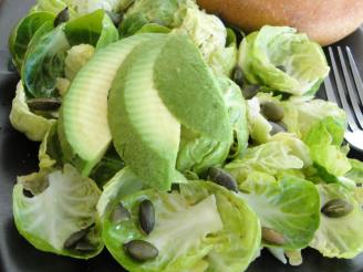 Brussels Sprout Salad With Avocado & Pumpkin Seeds