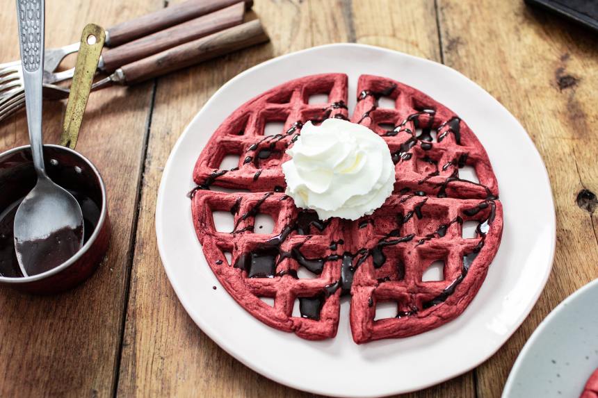 Indulge in fluffy red velvet waffles at Charlie Parker’s.