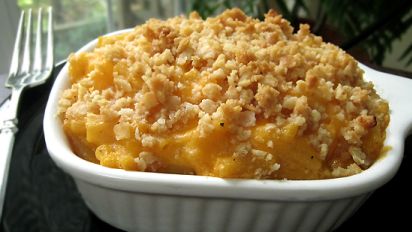 How can I get a thick cheese sauce for my macaroni and cheese?