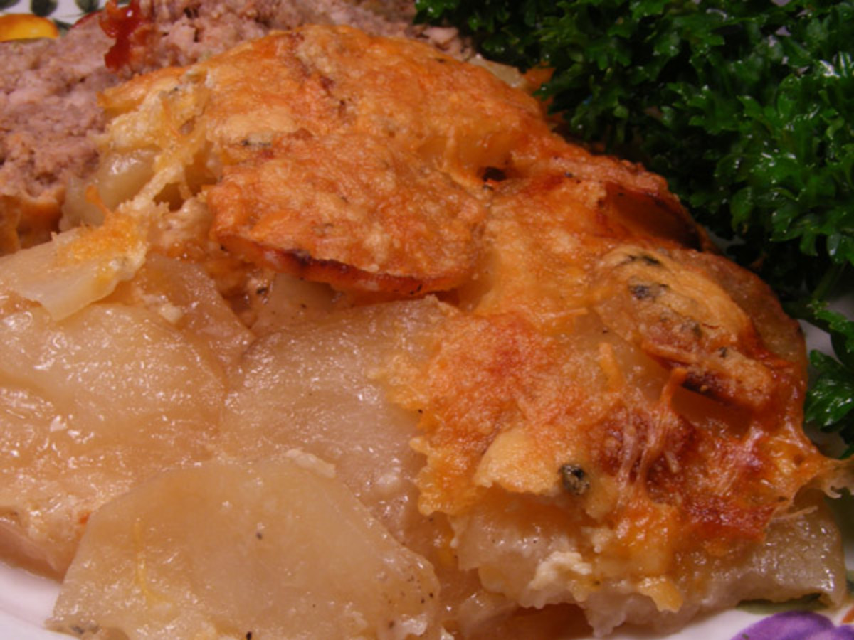 Scalloped Potatoes With Three Cheeses image