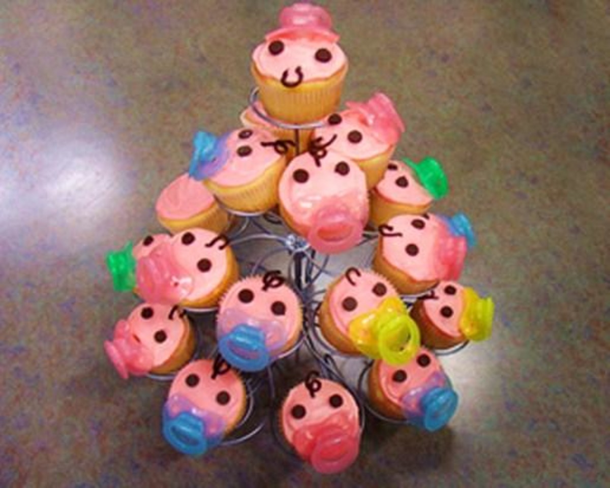 Baby pacifier cupcakes top