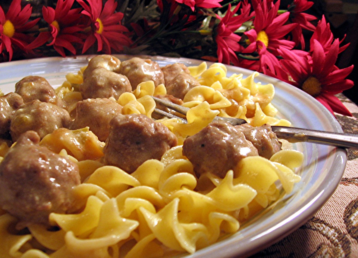 Easy and Yummy Meatballs over Buttered Noodles image