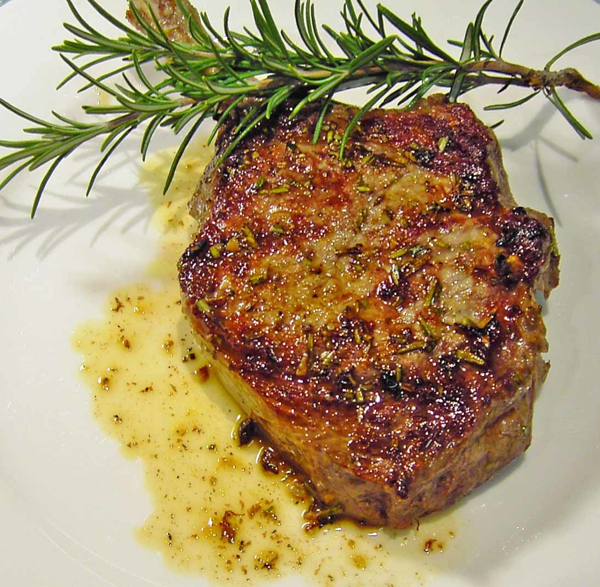 Grilled Veal Chops with Rosemary. 