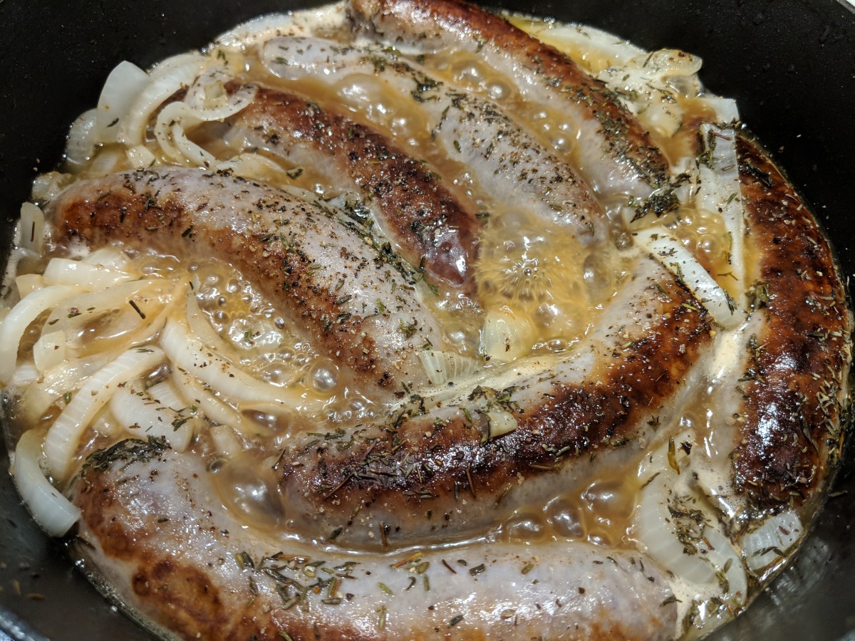 Brats With Whiskey Glazed Onions