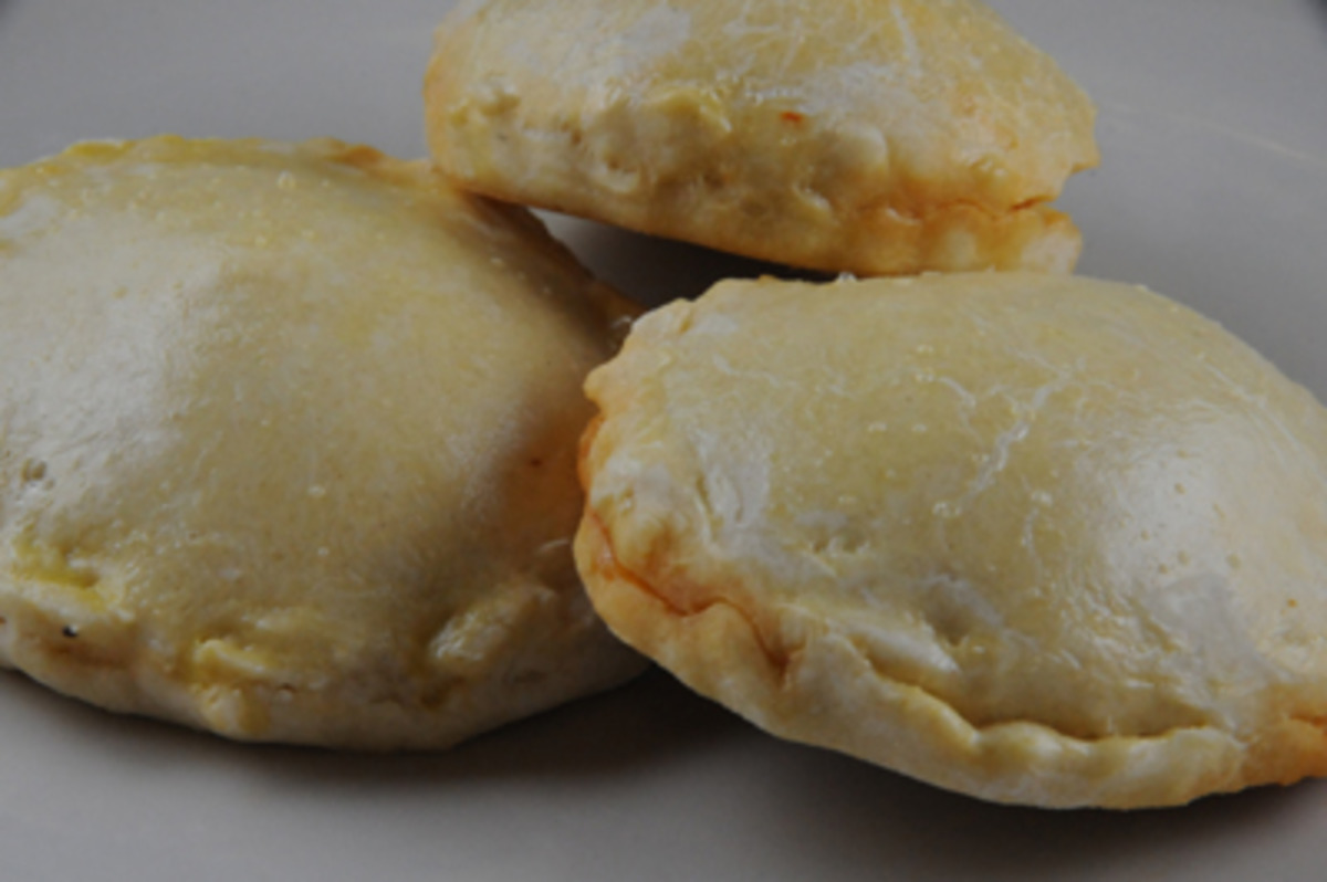 Pukacapas Spicy Cheese Empanadas Bolivia Recipe Food Com As you cook them, they puff up, leaving a cheesy center. pukacapas spicy cheese empanadas bolivia