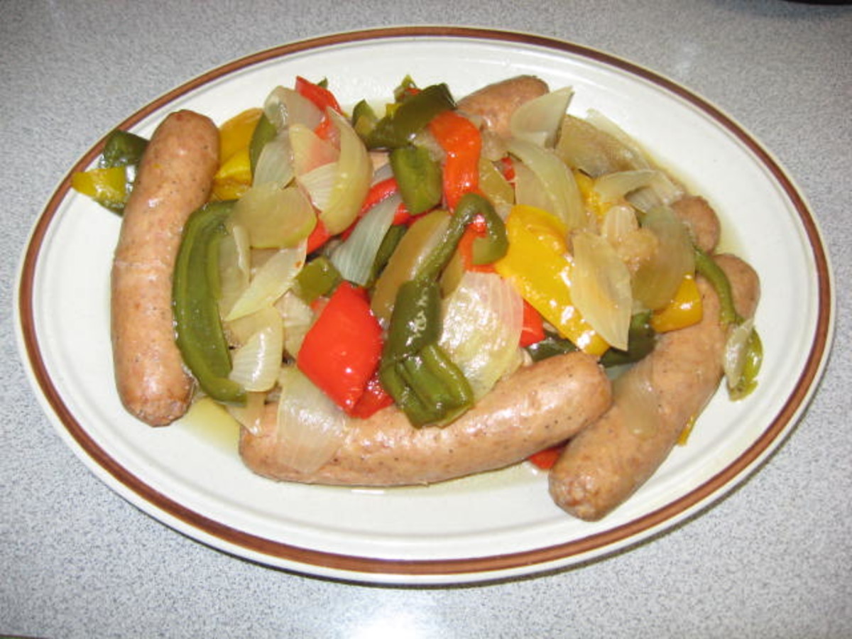 Slow Cooker Brats with Onions and Peppers - Cooking With Carlee