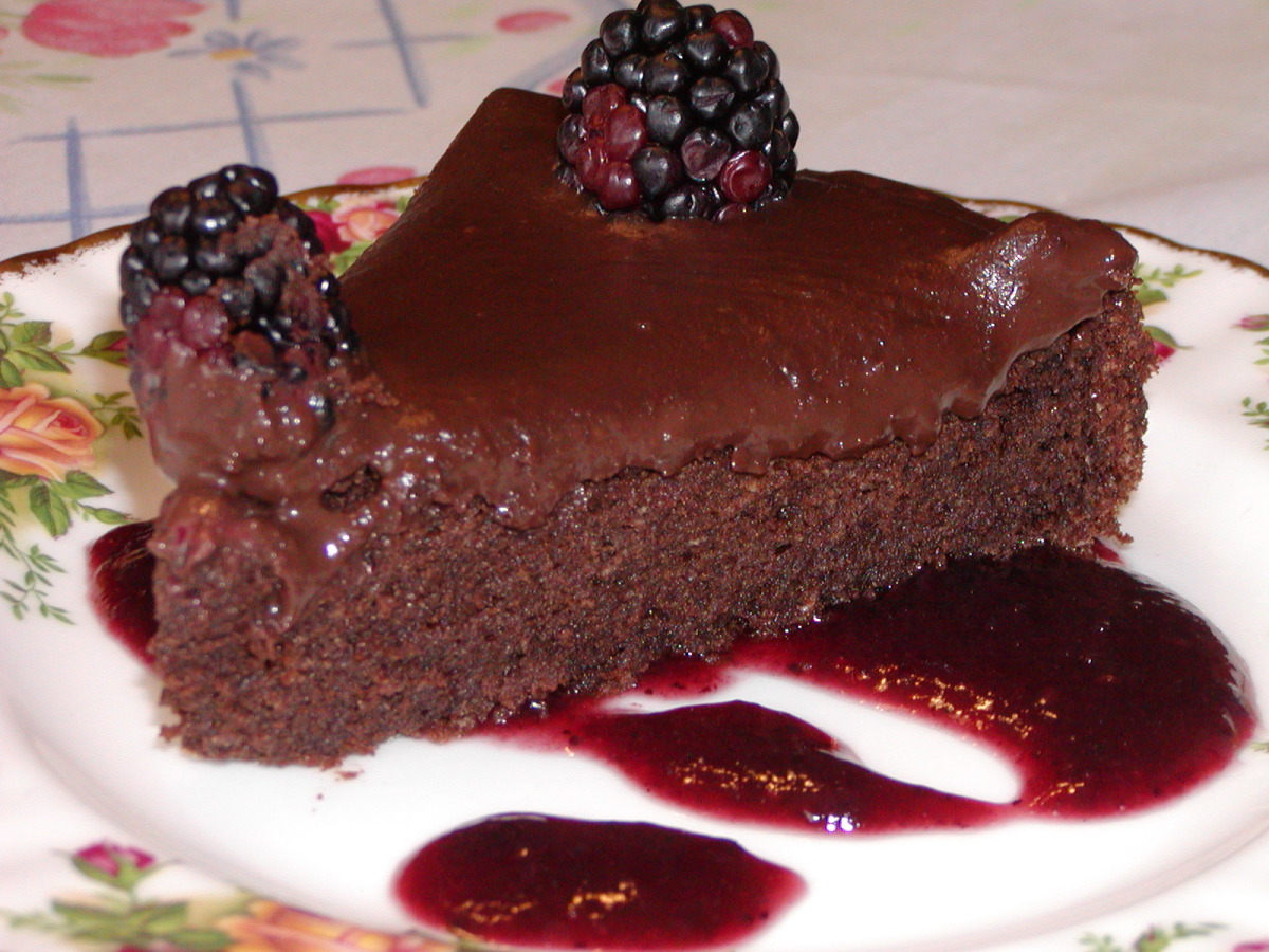 Decadent Chocolate Cake on a Bed of Raspberry Sauce image
