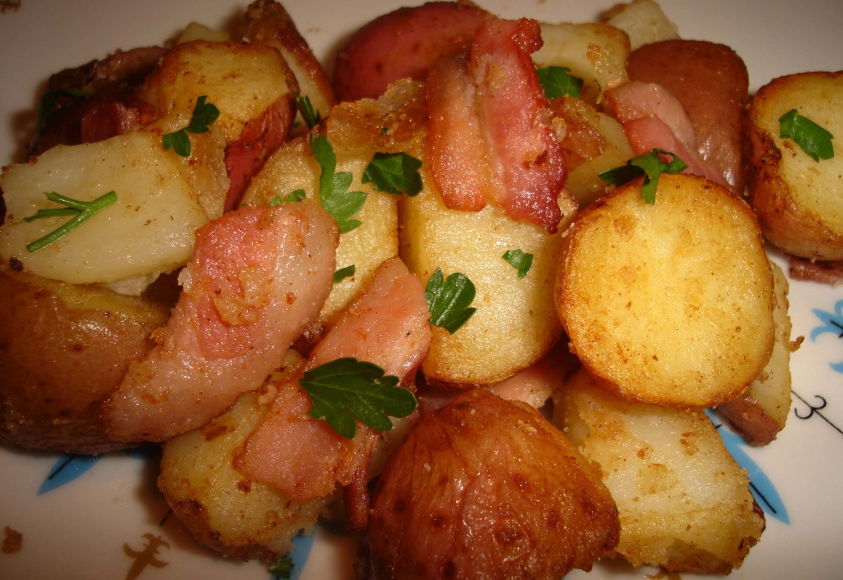 bacon fat crispy potatoes with garlicky kale and lemon-mint crème