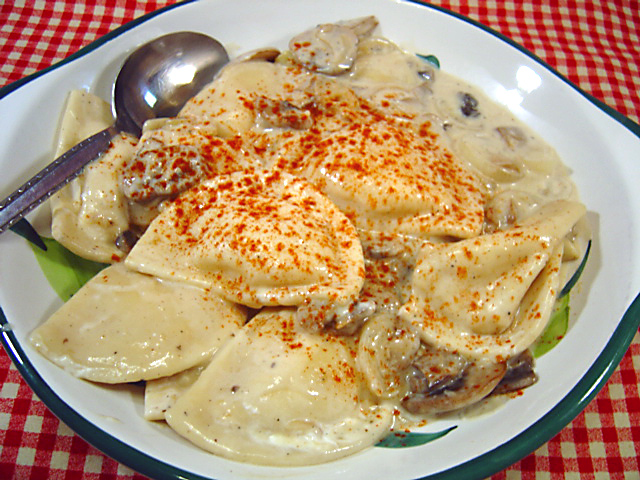 PIEROGIES WITH CREAMY MUSHROOM AND SHERRY SAUCE