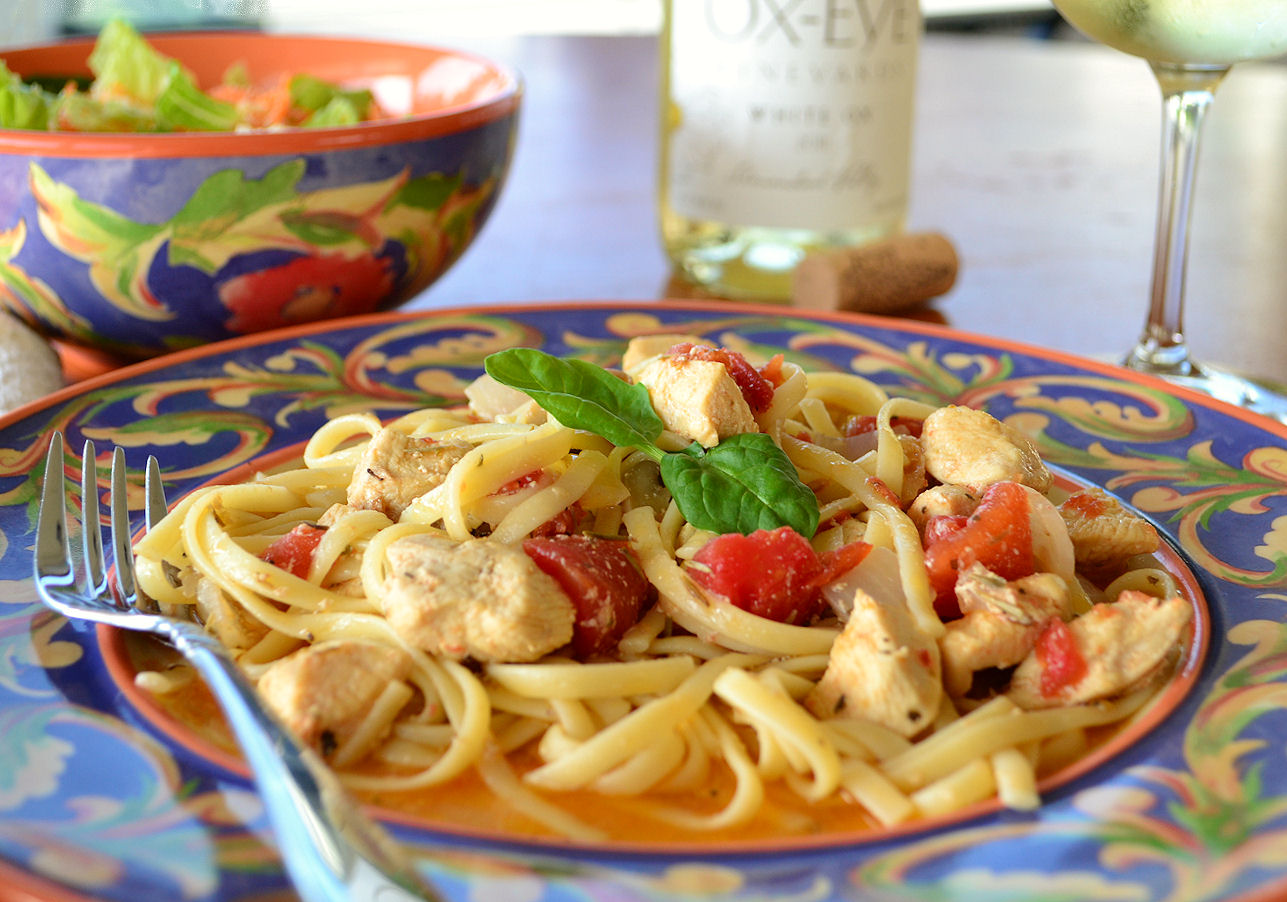 CHICKEN AND PASTA IN WHITE WINE GARLIC SAUCE