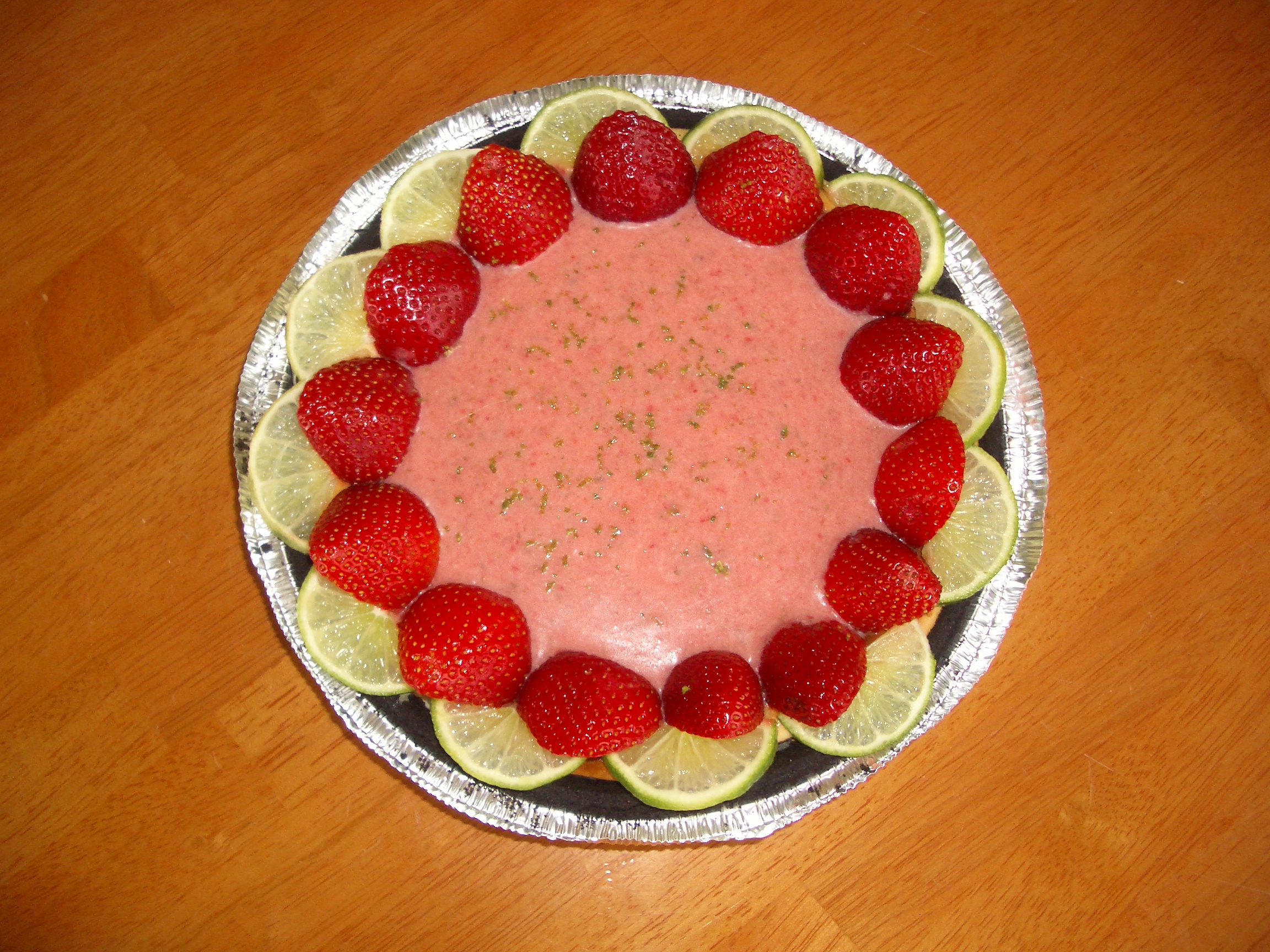 KEY LIME CHEESECAKE WITH STRAWBERRY BUTTER SAUCE