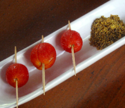 CHERRY TOMATOES MARINATED IN VODKA (IN OVERSIZED MARTINI GLASS)