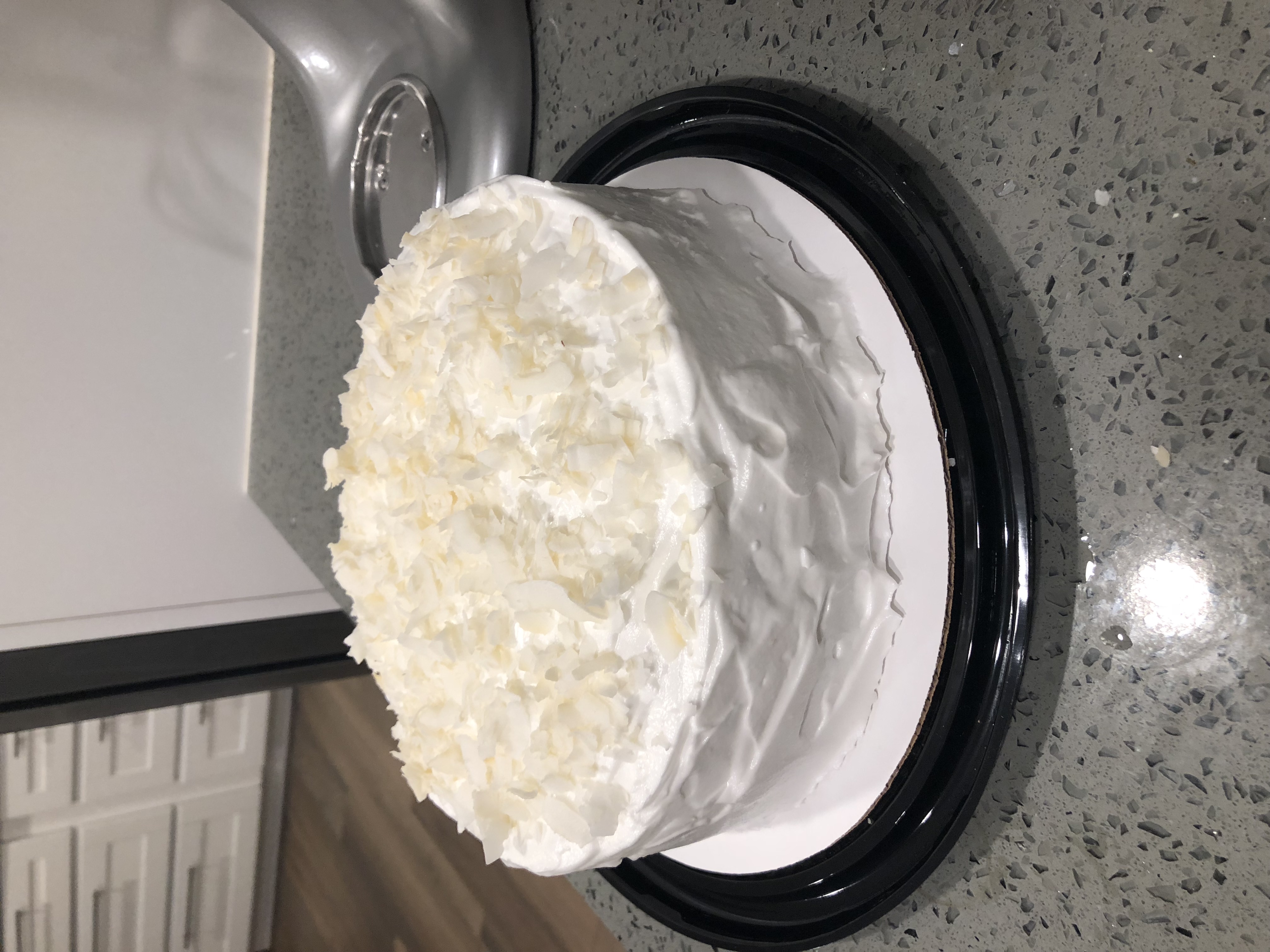 DOUBLE COCONUT CAKE WITH FLUFFY COCONUT FROSTING