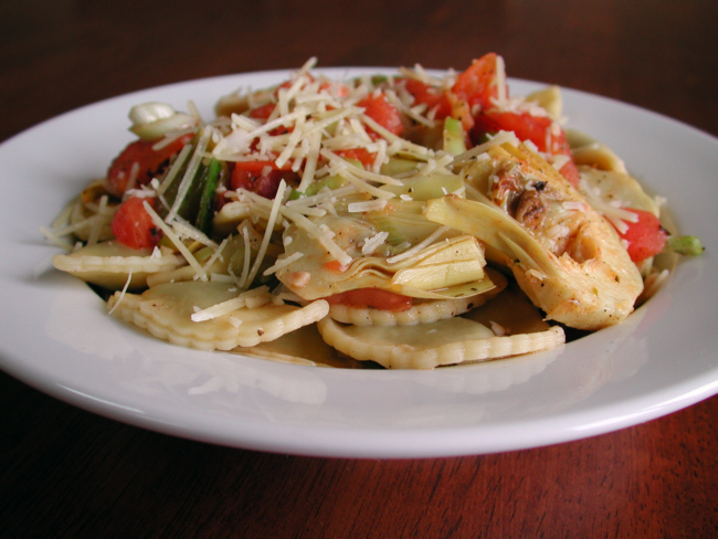 CHEESE RAVIOLI WITH FRESH TOMATO AND ARTICHOKE SAUCE