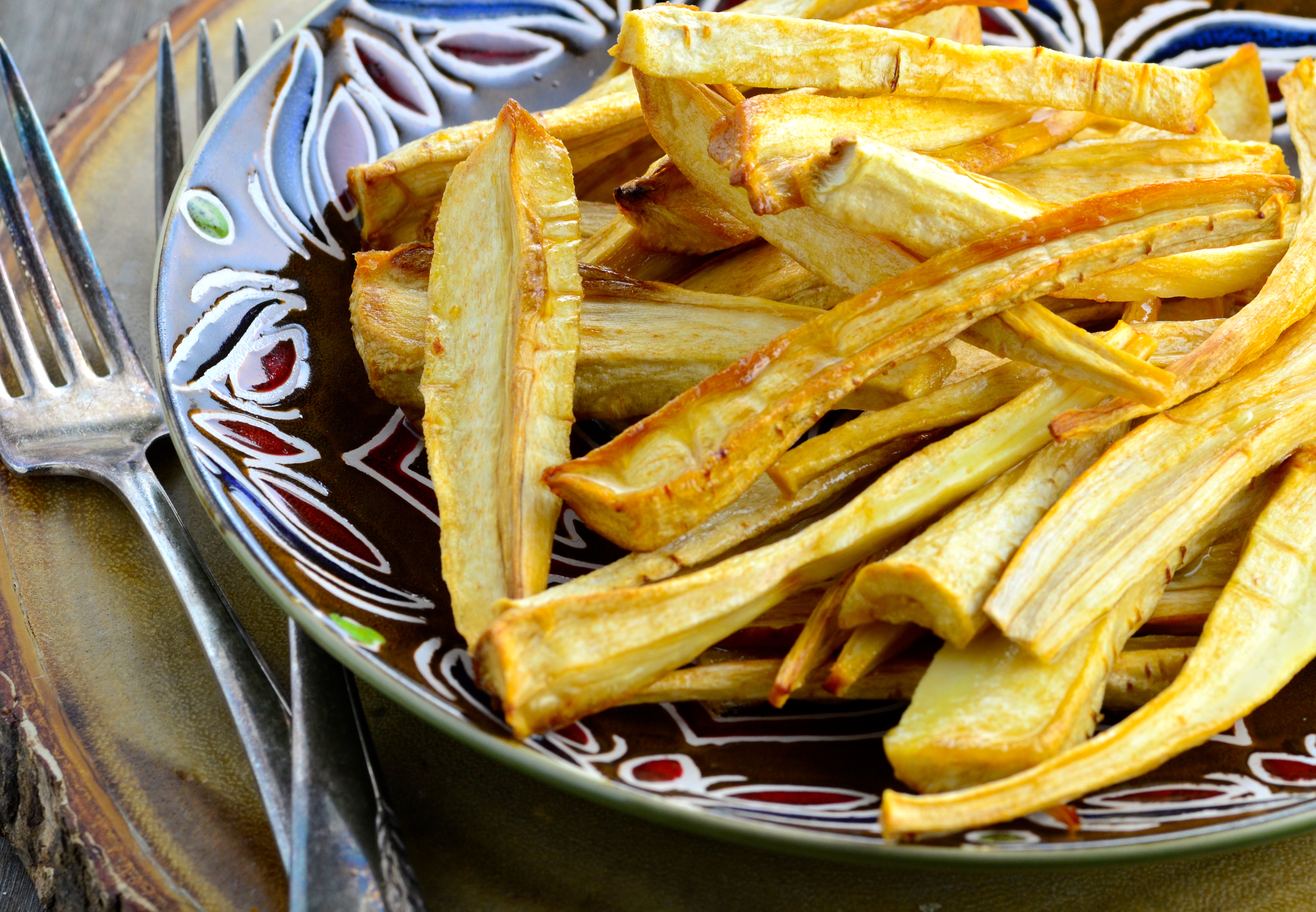 დ  OVEN-ROASTED PARSNIPS