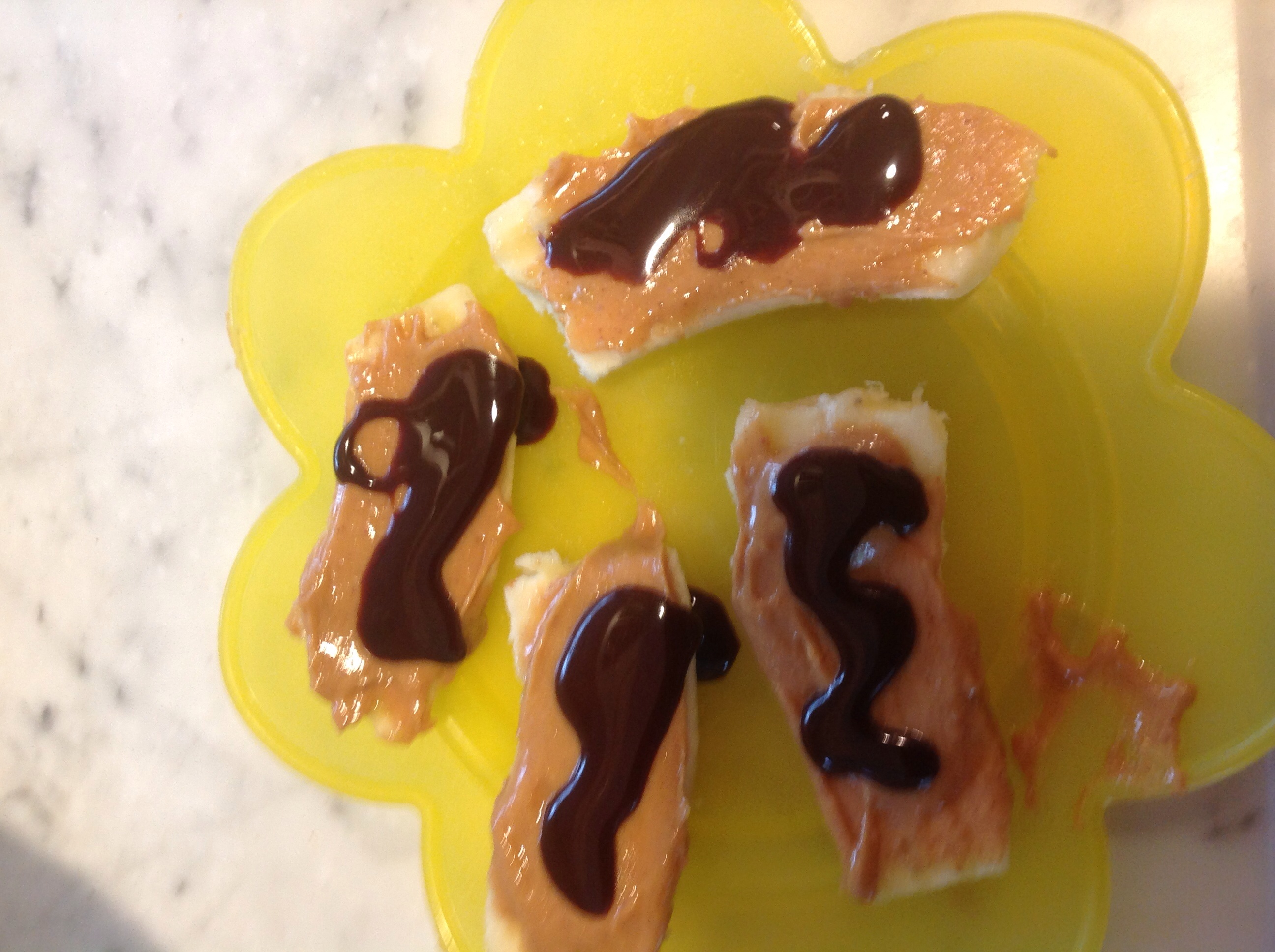 BANANA WITH PEANUT BUTTER & CHOCOLATE SYRUP