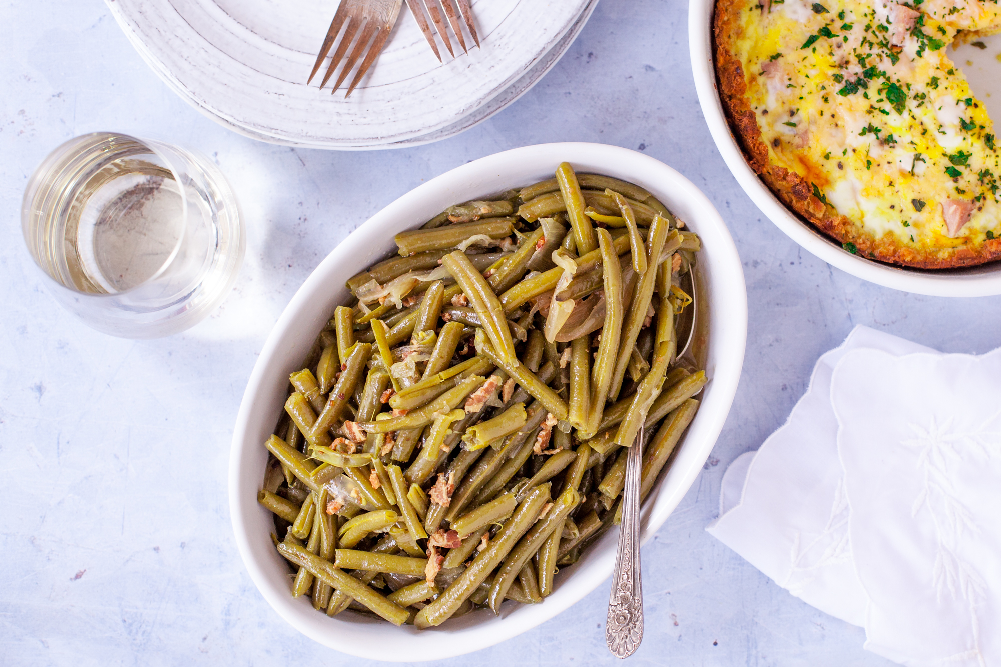 https://img.sndimg.com/food/image/upload/v1/img/recipes/18/77/95/y9aGDfM8S55sQeJklNTQ_crockpot-green-beans-1828.jpg