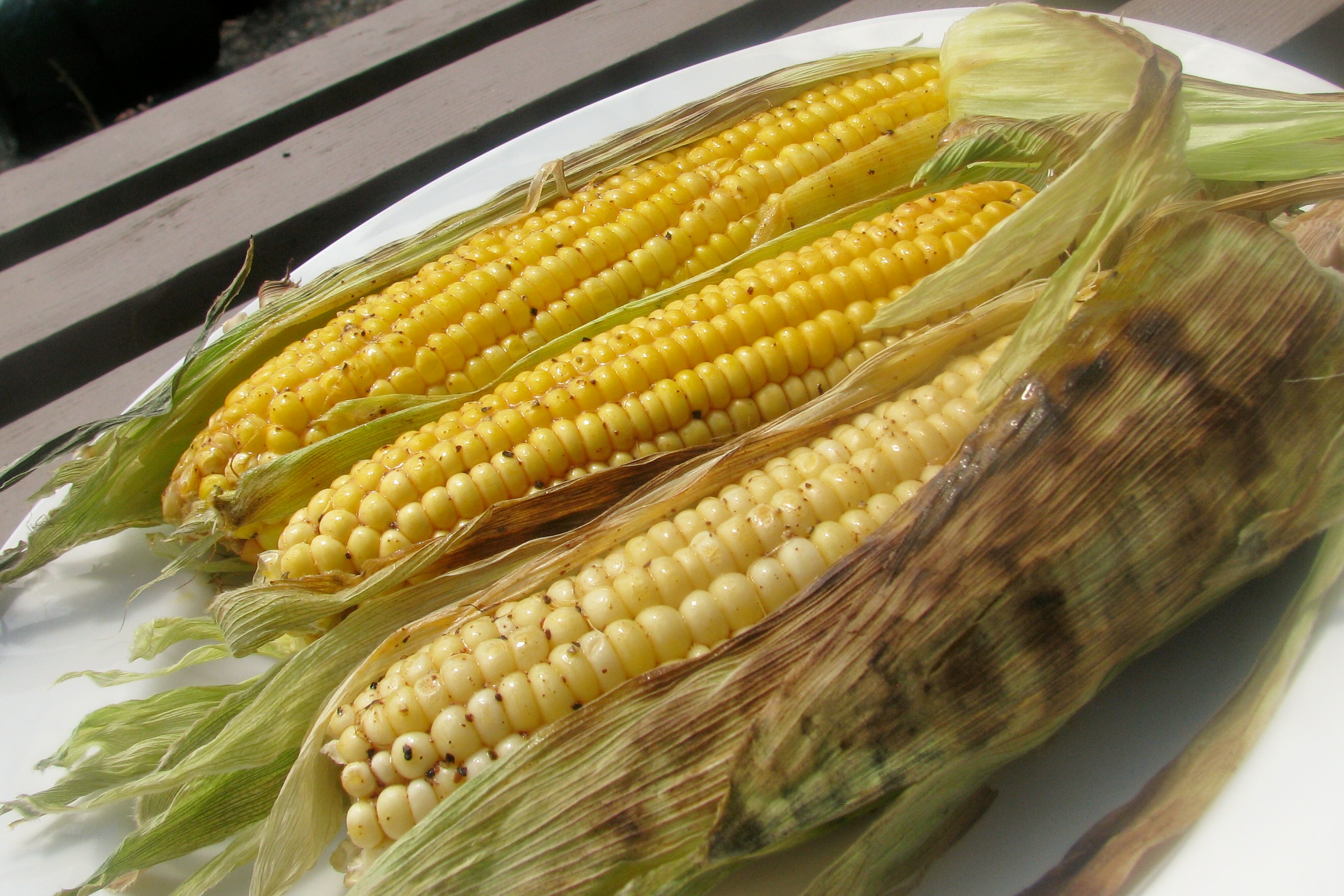 CORN COOKED IN HUSKS ON THE GRILL WITH CHILE-LIME BUTTER
